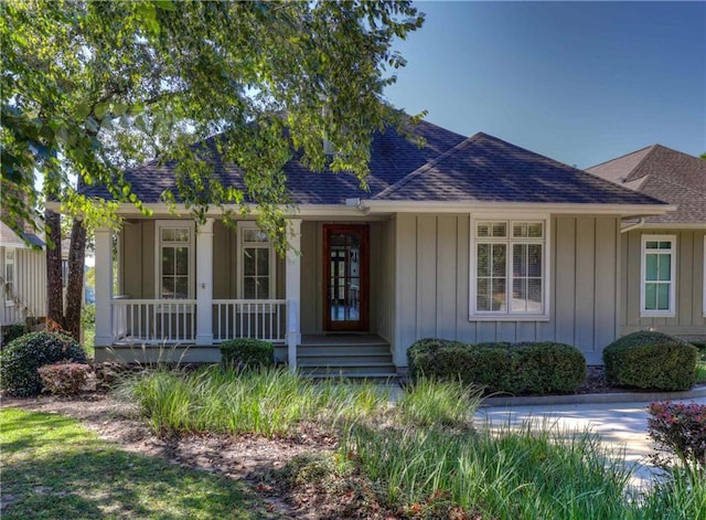 single story home featuring a porch