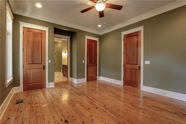 unfurnished bedroom with ceiling fan, light hardwood / wood-style flooring, and crown molding