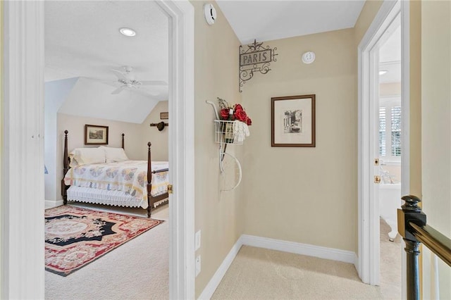 carpeted bedroom featuring ceiling fan and lofted ceiling