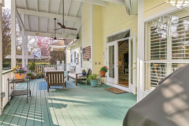 wooden terrace with ceiling fan