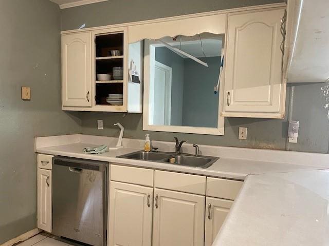 kitchen with a sink, light countertops, and dishwasher