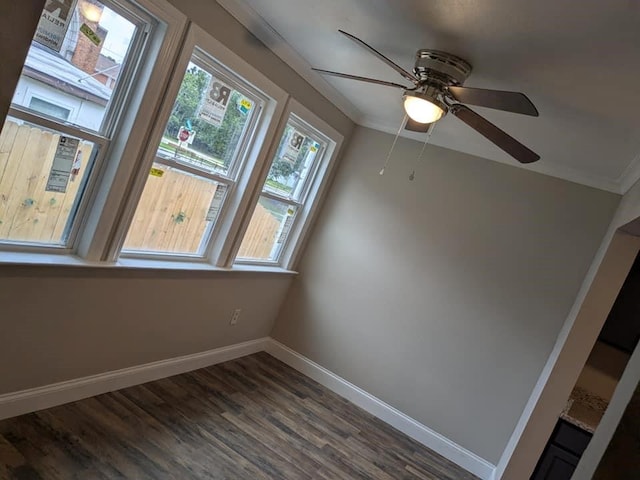 bonus room featuring ceiling fan and dark hardwood / wood-style floors