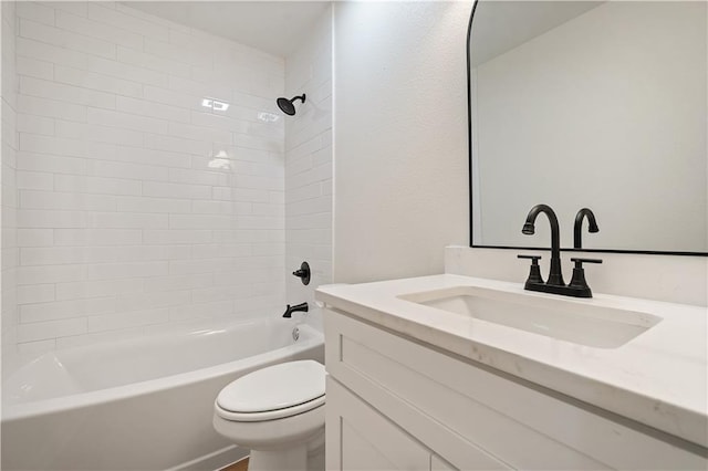 full bathroom with vanity, shower / tub combination, and toilet