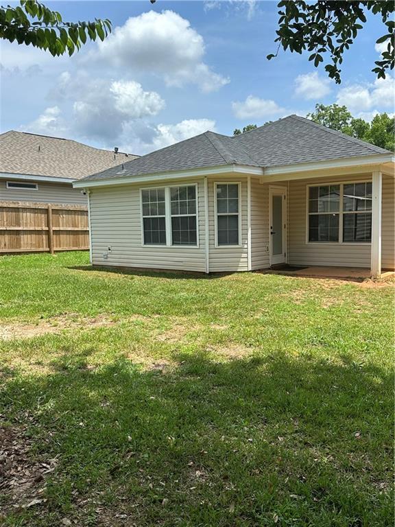 1010 Hamilton Bridges Dr E, Mobile, AL 36695 - back of property featuring a shingled roof