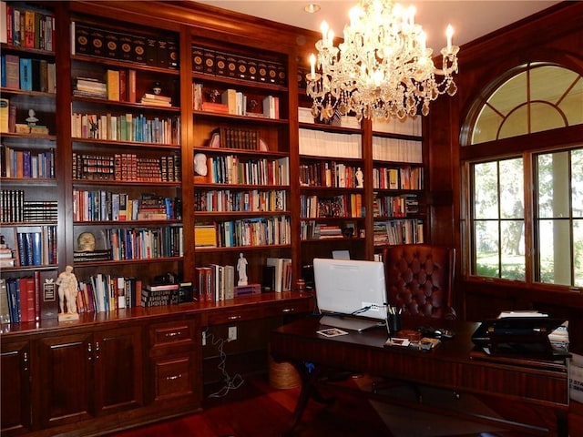 office area with an inviting chandelier