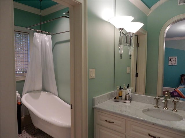 bathroom with oversized vanity and crown molding