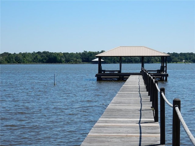 view of dock with a water view