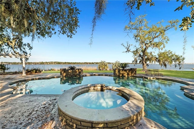 view of swimming pool featuring an in ground hot tub