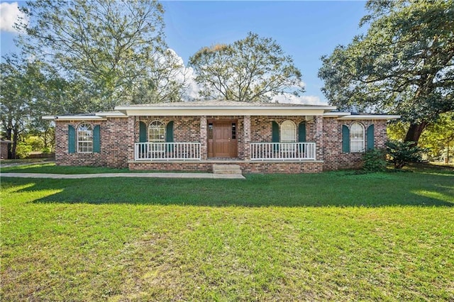 ranch-style house with a porch and a front lawn