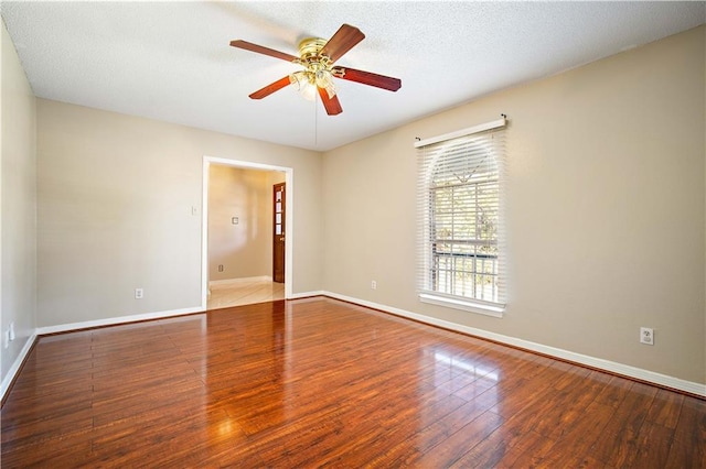 7183 Pine Barren Ct, Mobile, AL 36695 - unfurnished room with wood finished floors, a ceiling fan, and a textured ceiling