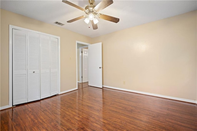 7183 Pine Barren Ct, Mobile, AL 36695 - unfurnished bedroom featuring wood finished floors, a closet, and a ceiling fan