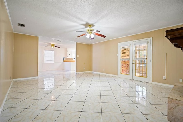 7183 Pine Barren Ct, Mobile, AL 36695 - unfurnished room featuring a ceiling fan, crown molding, and a textured ceiling