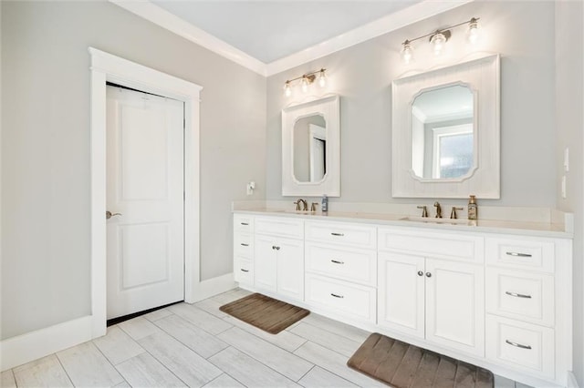 bathroom with vanity and ornamental molding