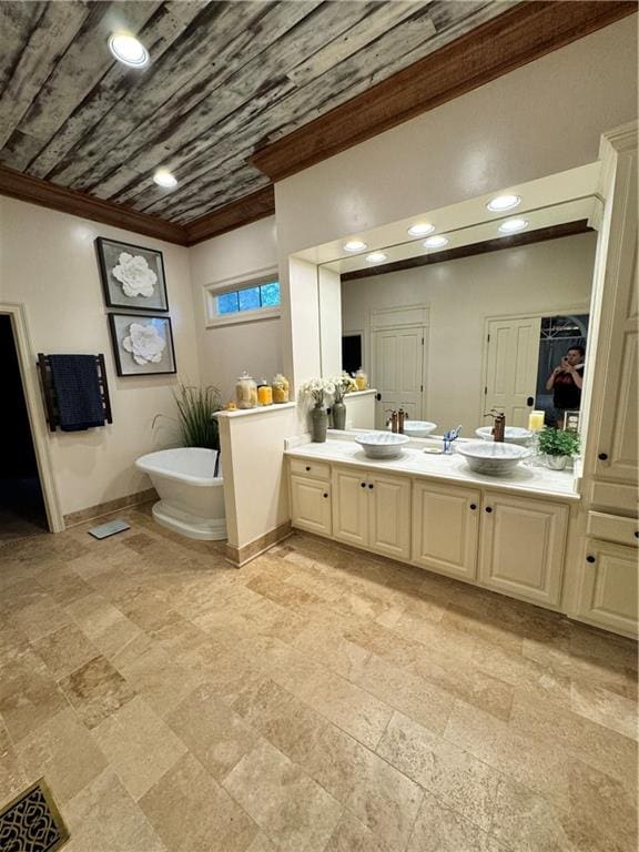 bathroom featuring a tub to relax in, vanity, and wood ceiling