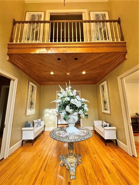 rear view of property featuring french doors, a chimney, stucco siding, and an outdoor pool