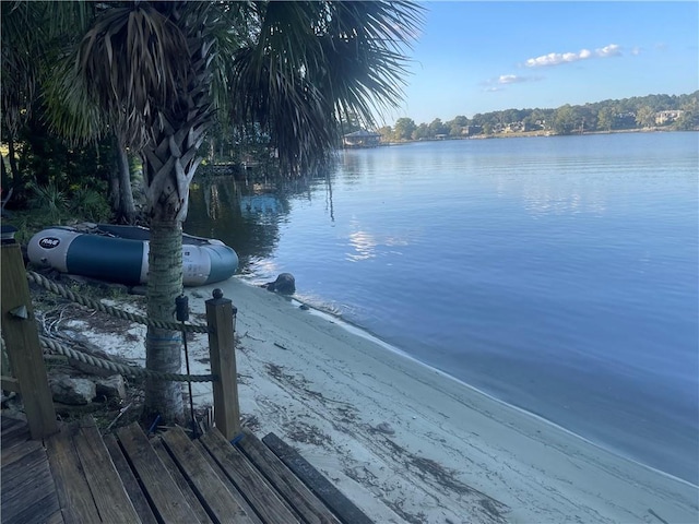 view of dock with a water view