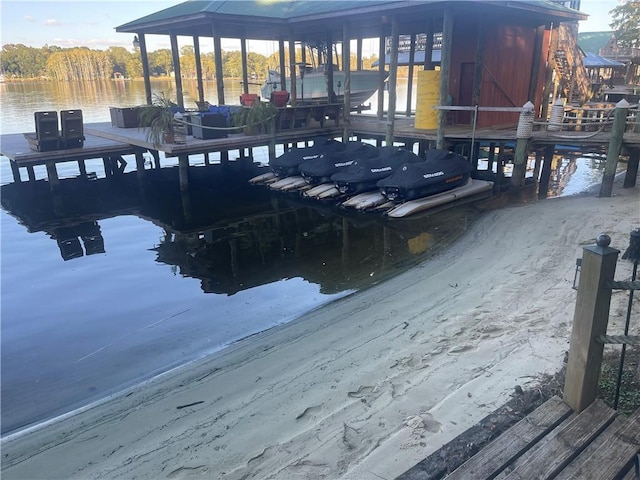 dock area featuring a water view