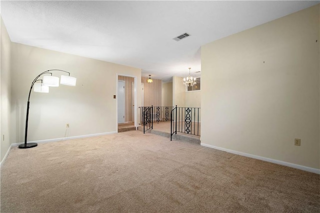 4205 Chesterfield Dr N, Mobile, AL 36618 - carpeted spare room with a chandelier and baseboards
