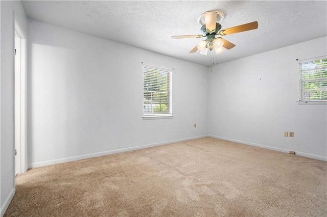 4205 Chesterfield Dr N, Mobile, AL 36618 - carpeted empty room featuring ceiling fan, a textured ceiling, and baseboards