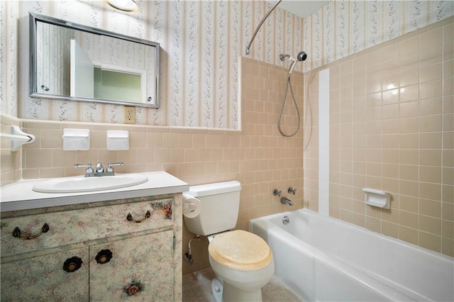4205 Chesterfield Dr N, Mobile, AL 36618 - full bath with wallpapered walls, bathing tub / shower combination, toilet, vanity, and tile walls