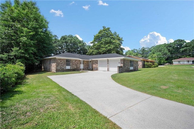 4205 Chesterfield Dr N, Mobile, AL 36618 - ranch-style home with an attached garage, a front lawn, concrete driveway, and brick siding