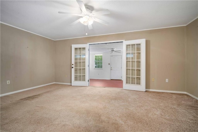 4205 Chesterfield Dr N, Mobile, AL 36618 - carpeted empty room with french doors, ceiling fan, crown molding, baseboards, and a textured ceiling