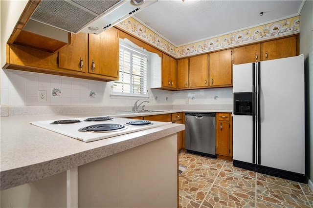 4205 Chesterfield Dr N, Mobile, AL 36618 - kitchen with white appliances, stone floors, a sink, brown cabinetry, and light countertops