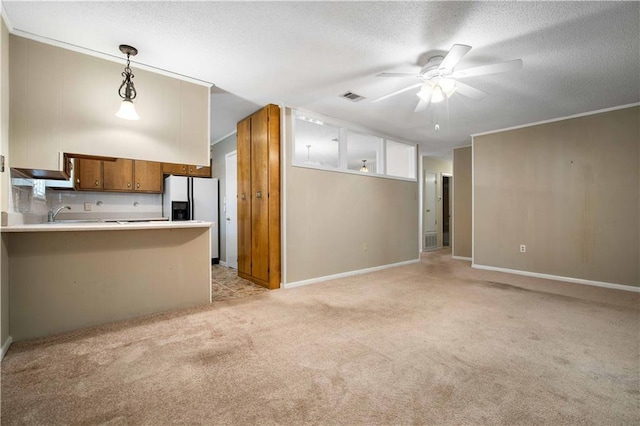 4205 Chesterfield Dr N, Mobile, AL 36618 - unfurnished living room featuring light carpet, a ceiling fan, a textured ceiling, and baseboards