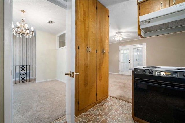 4205 Chesterfield Dr N, Mobile, AL 36618 - kitchen featuring range with electric cooktop, carpet floors, under cabinet range hood, a chandelier, and french doors