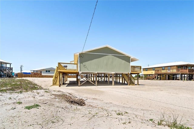 rear view of property featuring a carport