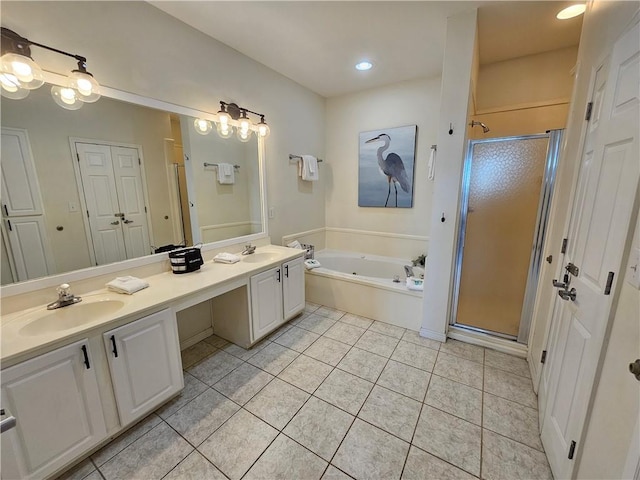 bathroom with vanity, tile patterned floors, and plus walk in shower