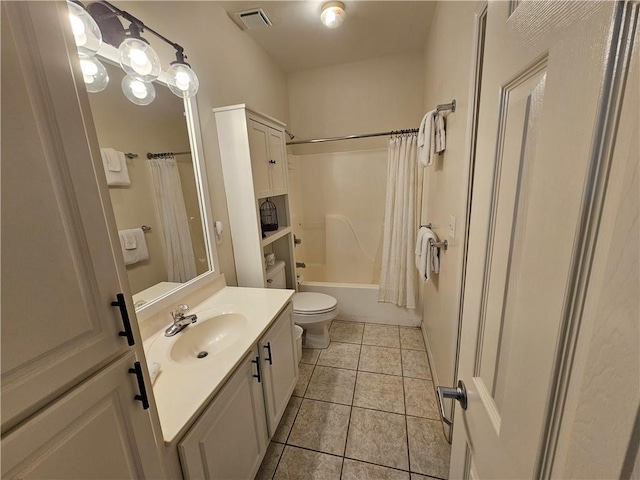 full bathroom featuring shower / tub combo, vanity, tile patterned flooring, and toilet