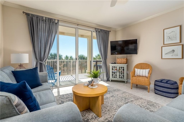 living room featuring crown molding, light tile patterned floors, and ceiling fan