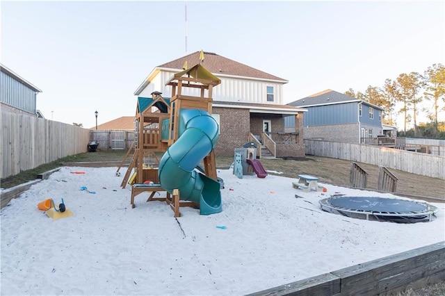 view of play area with a trampoline