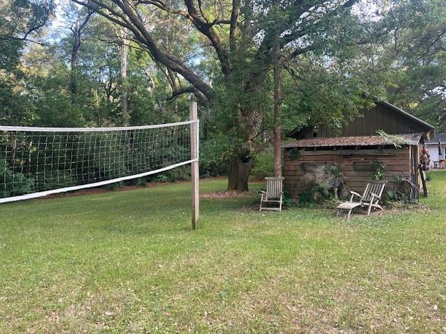 view of yard with volleyball court