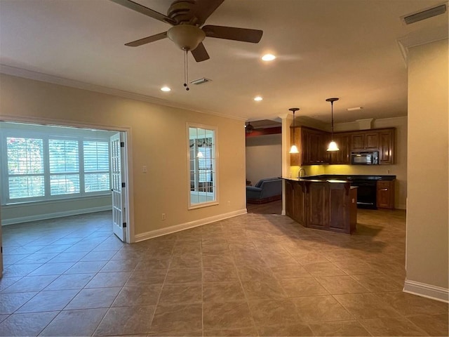 kitchen with ornamental molding, pendant lighting, tile patterned floors, and ceiling fan