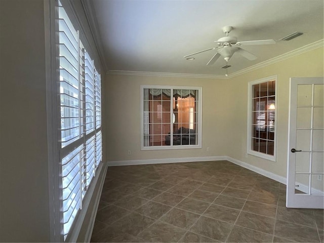 unfurnished room with ceiling fan and ornamental molding