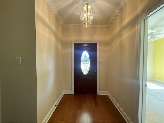 doorway to outside featuring wood-type flooring, ceiling fan with notable chandelier, and crown molding