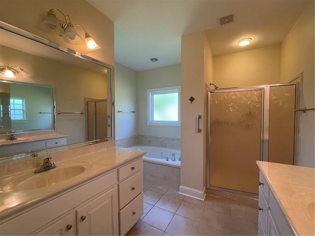 bathroom with tile patterned flooring, plus walk in shower, and vanity