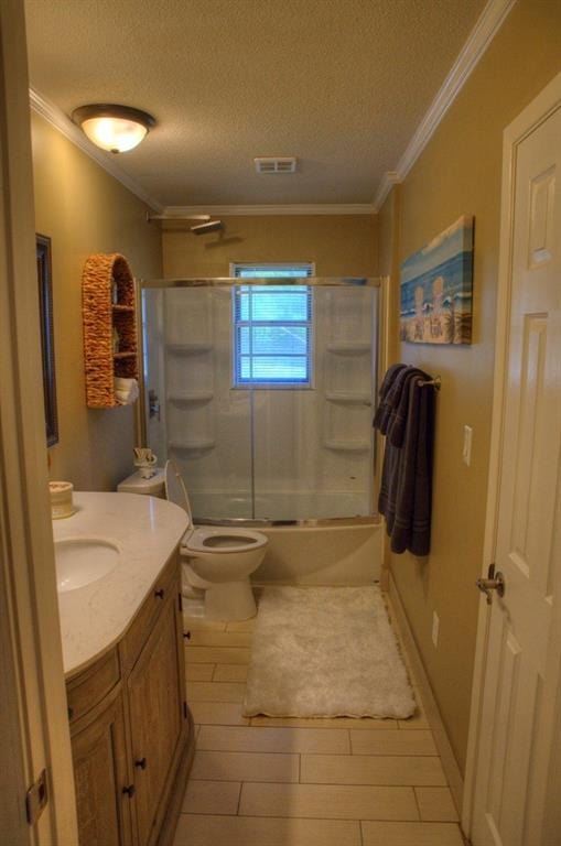 bathroom featuring enclosed tub / shower combo, toilet, vanity, visible vents, and a textured ceiling