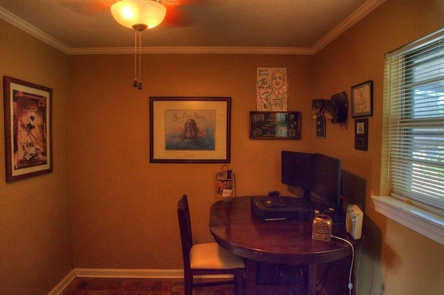 dining room featuring ornamental molding and baseboards