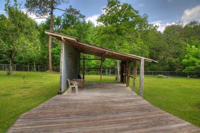 deck with fence and a yard