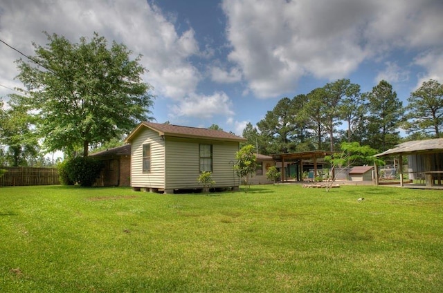 view of yard with fence