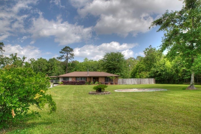 view of yard featuring fence