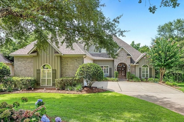 view of front of home with a front yard