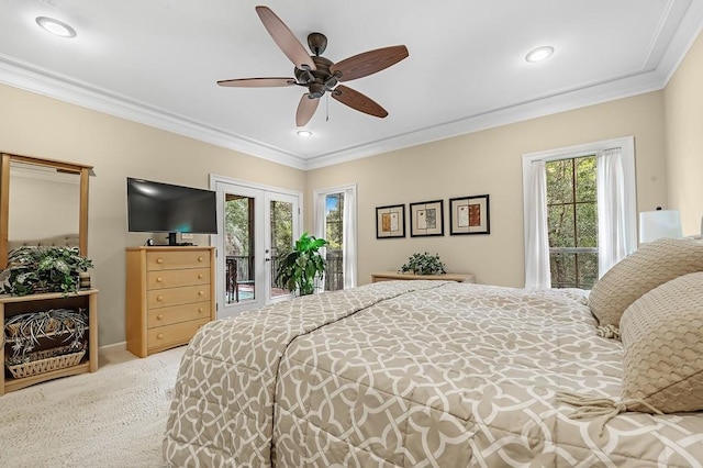 carpeted bedroom with access to exterior, crown molding, french doors, and ceiling fan