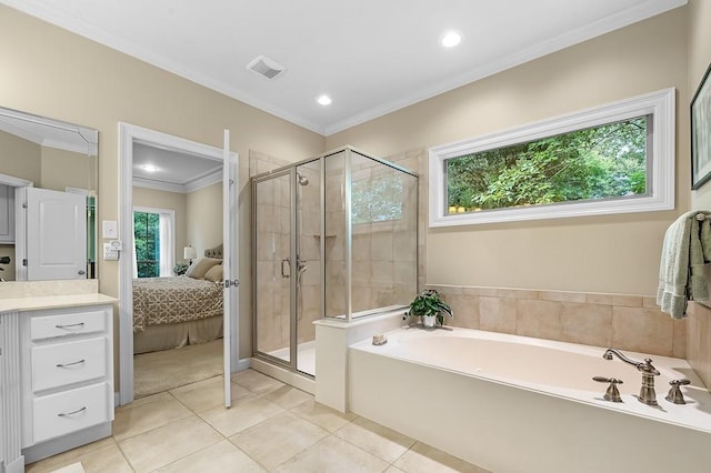 bathroom featuring tile patterned flooring, vanity, crown molding, and shower with separate bathtub