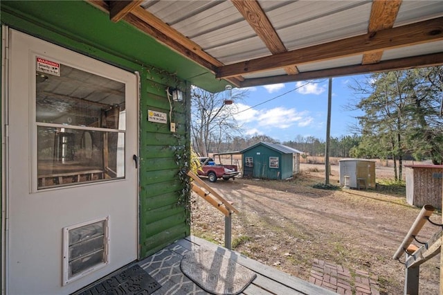 exterior space featuring a shed