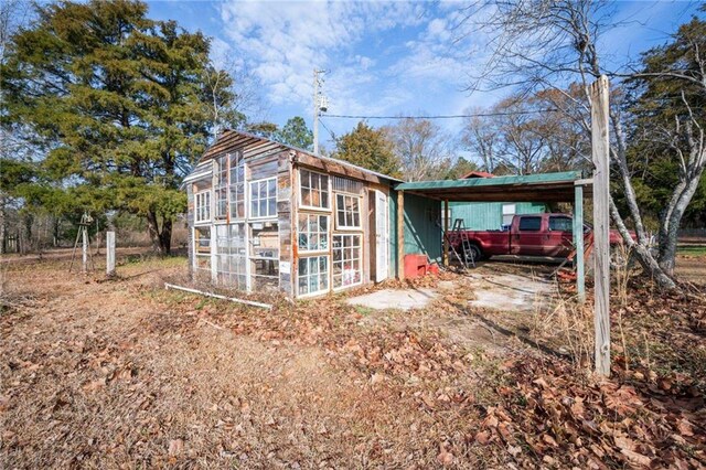 exterior space featuring an outbuilding