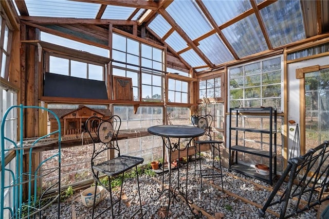 sunroom / solarium with lofted ceiling